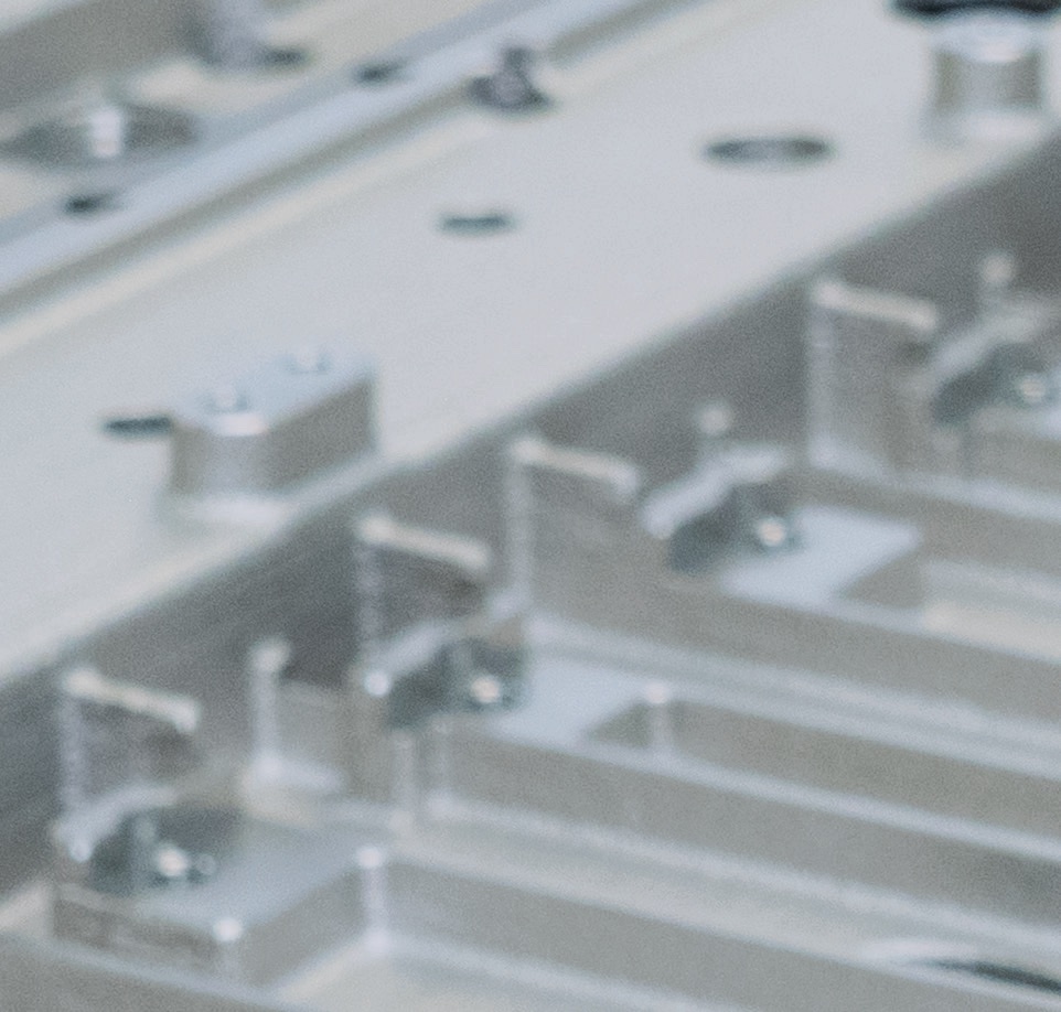 Machined surfaces of a cast housing for semiconductor cleanroom applications